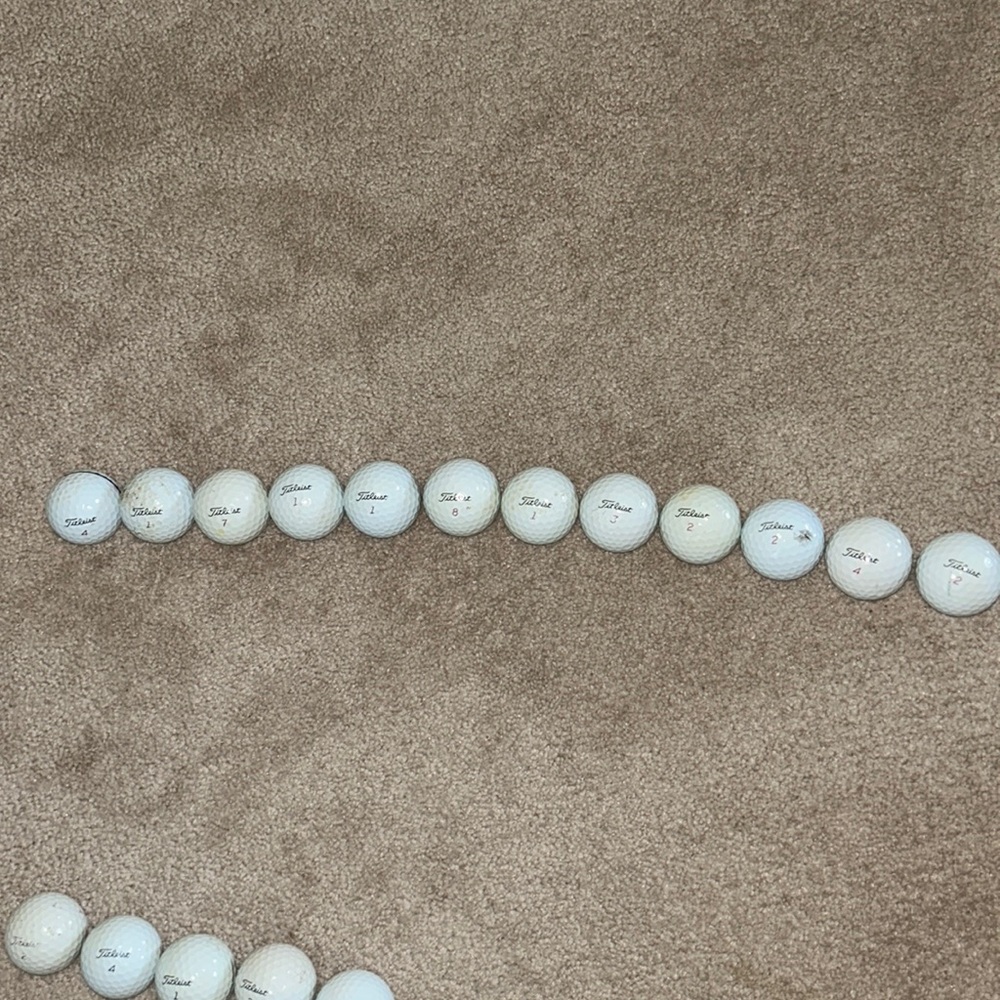 12 Titleist Pro V1x golf balls